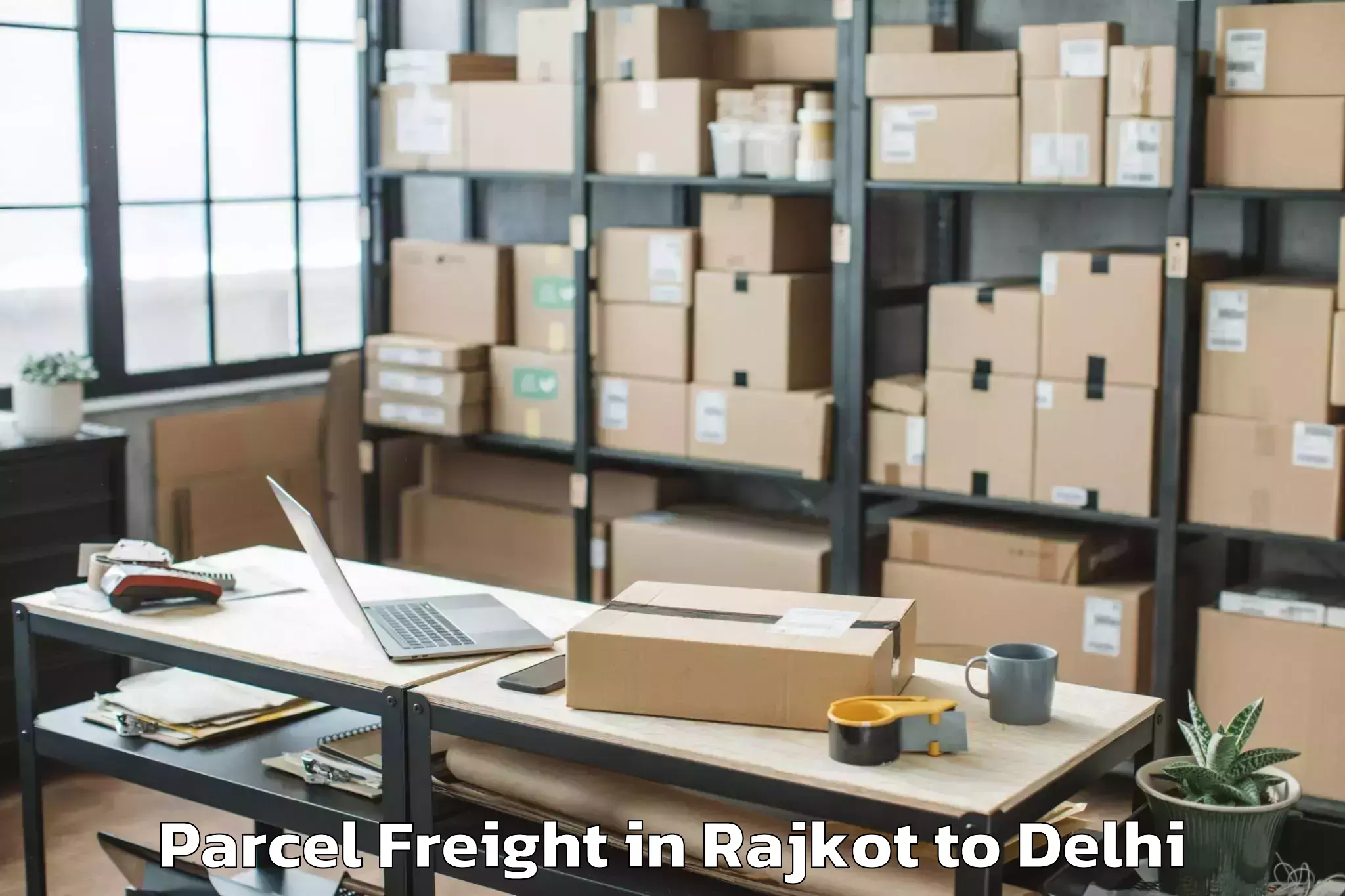 Book Rajkot to Hauz Khas Parcel Freight